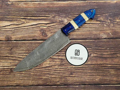 This limited edition handmade 8" Damascus Chef's Utility knife is part of the Butcher's Blade Summer 2021 Damascus series of knives. Each knife is handmade and no two handle are 100% identical, they are the same pattern and material but since they are made by hand there will be very slight variances if you compare 2 side by side.  This Knife is made of 420 layers of High Carbon Damascus steel with any 8" blade and 5" handle. Each knife come in a wooden storage box.