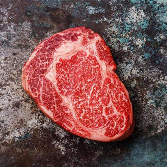 This 7+ graded Australian Wagyu split cut ribeye steak is marbled beautifully and cuts like butter, it is from Rangers Valley in Glen Innes, Australia. We hand select each loin prior to purchase to ensure that we offer nothing but the finest Wagyu on the Market.  crooked butcher meats