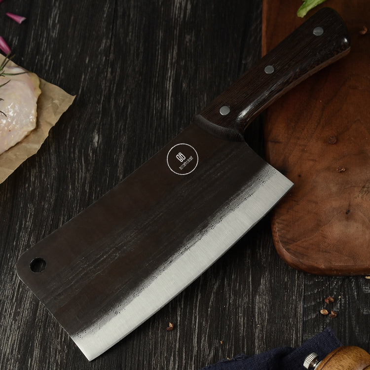 This classic High Carbon Butcher's style cleaver is big and solid knife that can chop or cut just about anything you can thow at it. It is heavy and makes cutting almost anything feel like slicing thru butter. Crooked Butcher