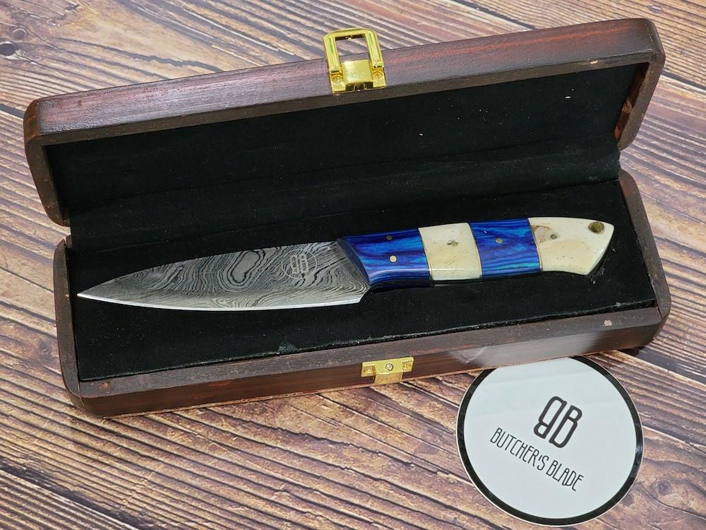 This limited edition handmade Pairing knife is part of the Butcher's Blade Summer 2021 Damascus series of knives. Each knife is handmade and no two handle are 100% identical, they are the same pattern and material but since they are made by hand there will be very slight variances if you compare 2 side by side.  This Knife is made of 420 layers of High Carbon Damascus steel with any 4.5" blade and 4.5" handle. Each knife come in a wooden storage box.